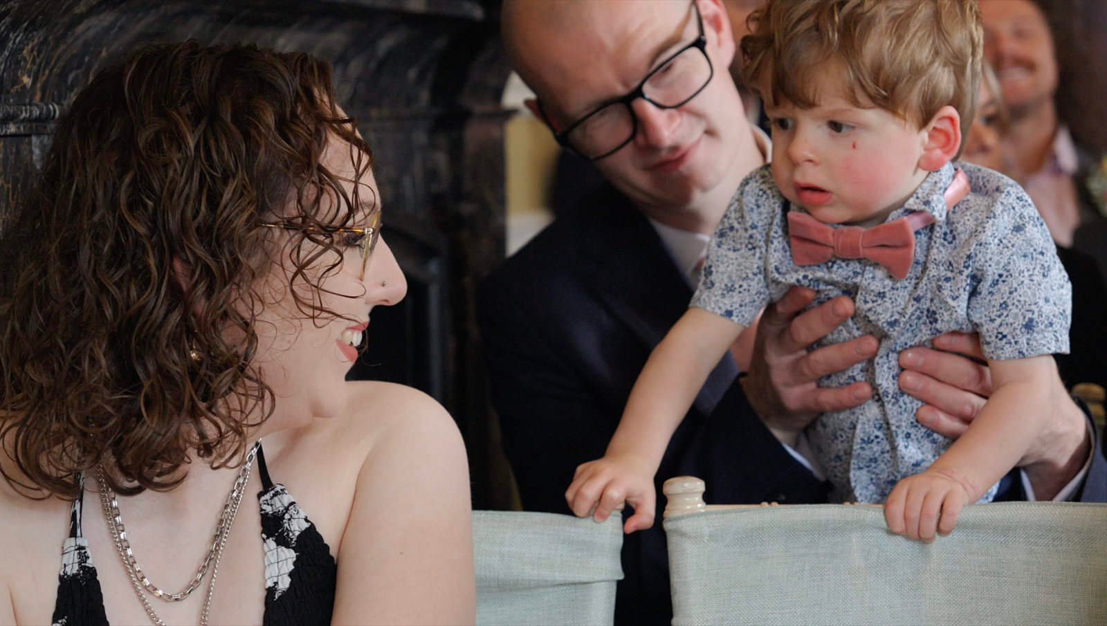 Wedding guests share a lighthearted at Shaw Hill Golf & Spa Hotel